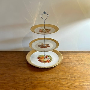 Stunning Gold and white with fruits Three Tier Cake Stand