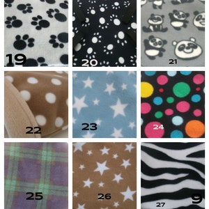 May include: Nine different fabric swatches with various patterns, including paw prints, stars, polka dots, pandas, and zebra stripes. The swatches are arranged in a grid of three rows and three columns.