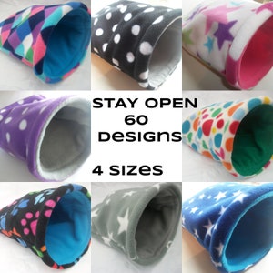 May include: A collage of nine images showing different designs of fleece pet beds in the shape of a tube. The text "STAY OPEN 60 DESIGNS 4 SIZES" is in the centre of the collage.