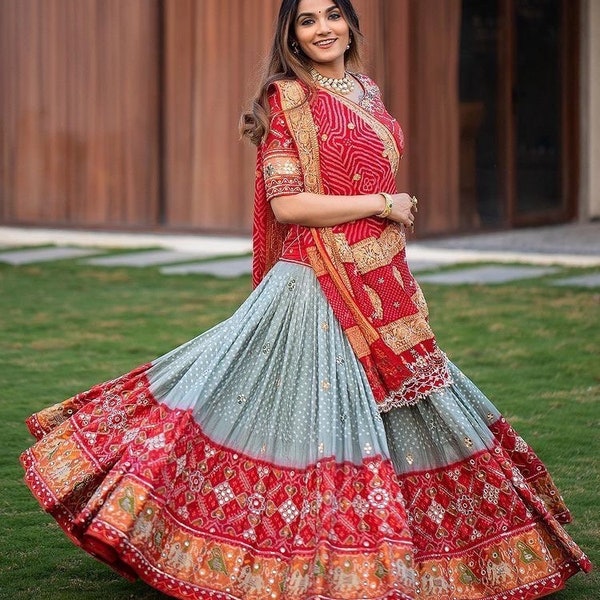Navratri Special Lehenga Choli With Printed Butter Silk Material and glued Mirror Work. Express shipping for Garba UK, US, Canada