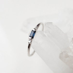 Platinum Baguette Sapphire Ring with Diamond Accents