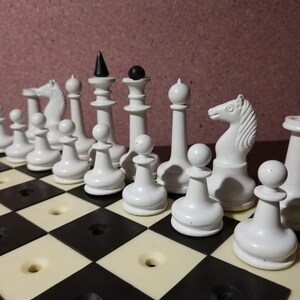 Chess set &quot;Schkolnyk&quot; on pegs for travel and for people with visual impairments 1950s