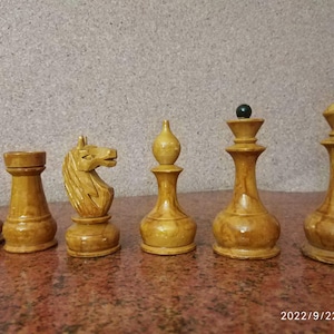 Chess pieces of the 1960s in their original box.