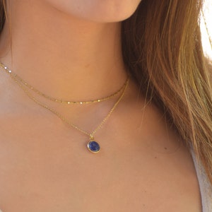 Gold and hotsell blue necklace
