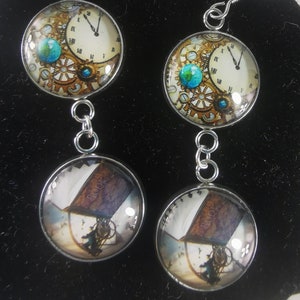 Pair of earrings double cabochons cogs, clock and a man riding a bike under a flying book