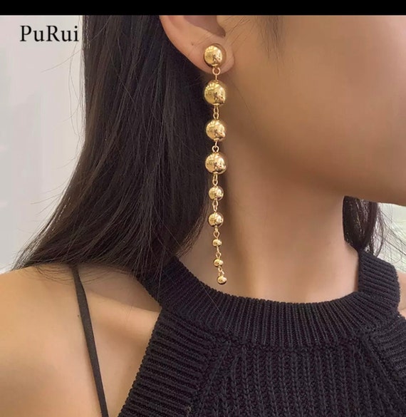 Light weight gold dangling earrings designs - Simple Craft Idea