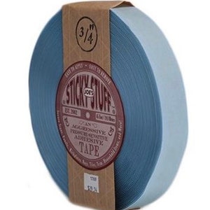 May include: A roll of blue 3/4 inch wide Sticky Stuff Joe's adhesive tape. The tape is labeled "An Aggressive Pressure Sensitive Adhesive Tape" and "Easy to Apply - Easy to Remove".