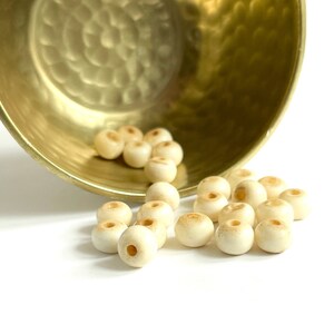 BONE BEADS | 10x6mm Lightly Stained Bone Beads in Ecru (Package of 35)