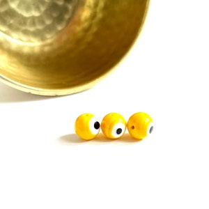 CUENTAS DE OJO MALVADO / Cuentas de vidrio de Murano redondas y lisas de 10 mm con doble ojo malvado en amarillo brillante (paquete de 3)