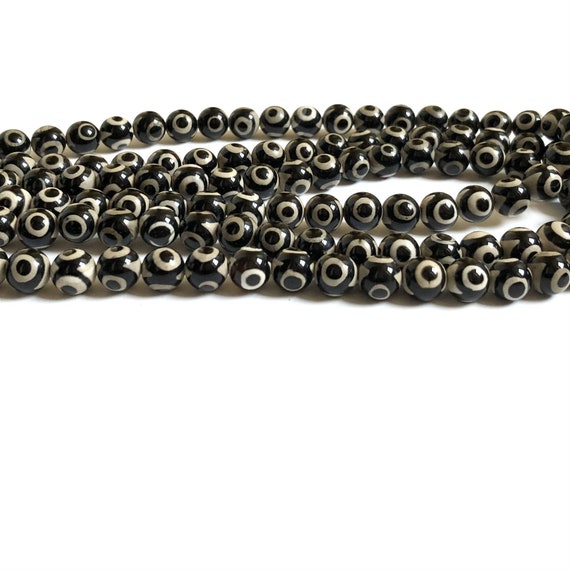 TIBETAN AGATE 7.25 Half Strands White Triple Third 10mm Faceted Tibetan Agate Beads in a Black Eye Design