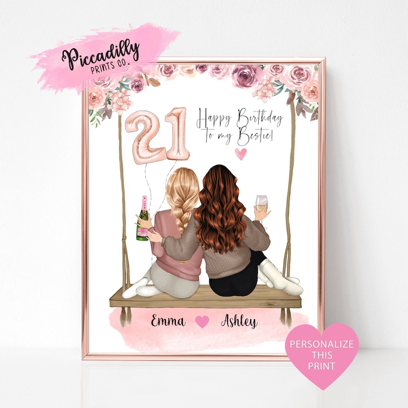 May include: A printable birthday card featuring two women sitting on a swing with a pink and white floral background. The card says "Happy Birthday to my Bestie!" and has the number 21 in pink balloons. The names Emma and Ashley are written at the bottom of the card.