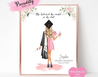 May include: A printable graduation design featuring a woman in a black graduation gown and pink dress, holding a glass of wine. The text reads "She believed she could so she did!" and "Class of 2021".