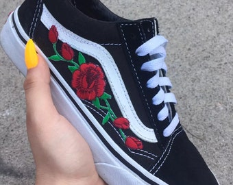 black vans with roses embroidered