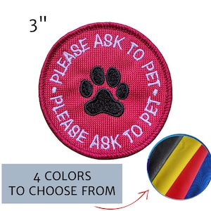 May include: A round, embroidered patch in a vibrant pink color, featuring the text "PLEASE ASK TO PET" in white, surrounding a black paw print. The patch is 3 inches in diameter. The image also shows a color swatch with four color options.