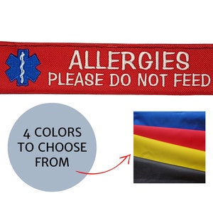 May include: Red fabric tag with white embroidered text: "ALLERGIES PLEASE DO NOT FEED." A blue medical symbol is embroidered on the left. The tag is for a pet. The image also shows a color palette with four color options.
