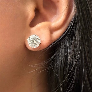 Certified 6 Carat Diamond Studs, IGI Certified 6 Carat Diamond Studs in 14K White Gold. 6 Carat Diamond Earrings