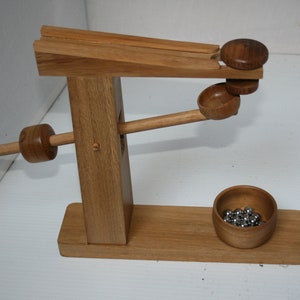 Teak Amish style  automata Ball bearing automata Fun with ball bearings Handmade automata ball bearing game Teak ball bearing game