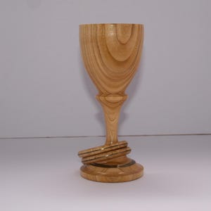Goblet in Irish Cherry with two captive rings and brass inserts.