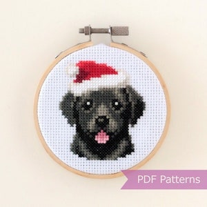 Kruissteek PDF van een zwarte Labrador met kerstmuts - Kerstborduurwerk van een zwarte Labrador - Direct te downloaden - Klein formaat