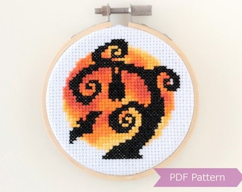 May include: A cross-stitch pattern of a black silhouette of Jack Skellington from The Nightmare Before Christmas, with a bright orange and yellow moon behind him. The pattern is framed in a wooden hoop. PDF Pattern.