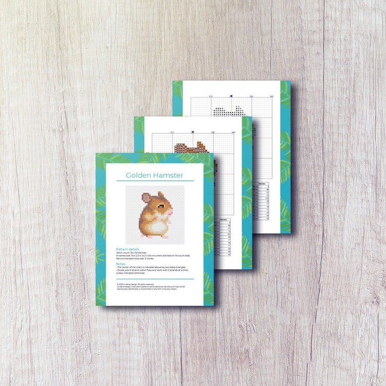May include: A cross-stitch pattern for a golden hamster. The pattern includes a color chart and a grid with symbols. The pattern is titled "Golden Hamster".