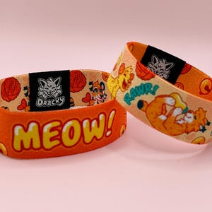 Big Kitties vändbart elastiskt armband