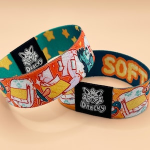 Diapers, paci's, and a plush - reversible elastic wristband