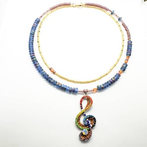 Rainbow necklace. Treble clef. Music jewelry. Music lovers. colorful. Glass necklace. Rainbow crystals. crystal jewelry. Crystal pendant.