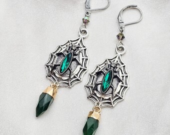 Web earrings. Insect jewelry. Bug jewelry. Moldavite. black stones. Crystals. Jeweled. Teal crystal. Halloween. creepy jewelry. spider.