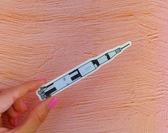 Sticker: Saturn V Rocket - die cut vinyl sticker, science gift, hand drawn cartoons, NASA space travel, rocket launch, outer space sticker