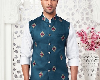 Chaqueta Nehru de tela de terciopelo de color azul verdoso con motivos bordados por todas partes