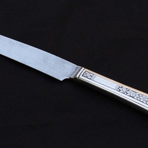 S.G. Rogers Floral silver plate dinner knife (Rose design, Floral pattern 1938)