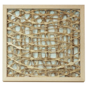 May include: A square wall decor piece with a wooden frame and a woven paper design. The paper is a light brown color and has a natural, organic texture. The design is abstract and creates a sense of depth and dimension.