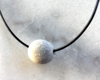 One beach stone pendant, beach pebble necklace in an adjustable black leather cord