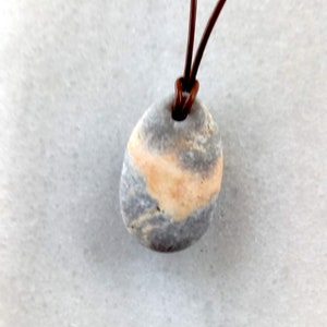 Beach stone necklace, Beach stone pendant necklace, Pebble pendant necklace with one flat orange grey pebble in light brown leather cord
