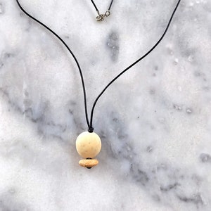 Two beach pebble pendant, two beach stone necklace, beach pebble necklace in black leather cord