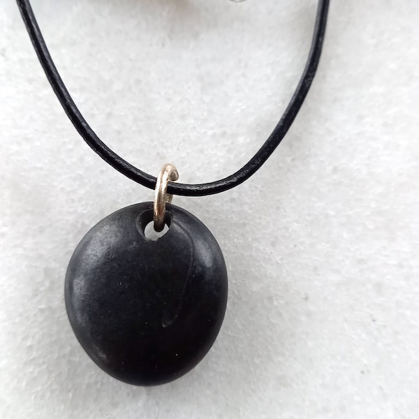 One black beach pebble pendant, beach stone necklace, beach pebble necklace in black leather cord and silver ring