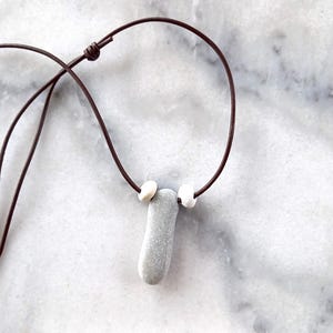 Three beach pebble pendant, beach stones necklace, pebble necklace in a adjustable dark brown leather cord