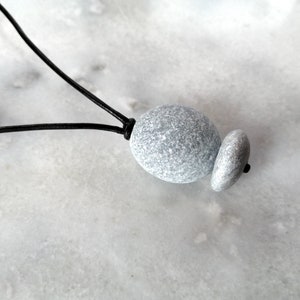 Two grey beach stones pendant, beach stone necklace, pebble necklace in black leather cord