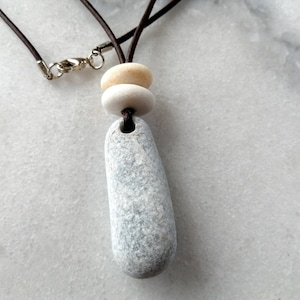 Three beach pebble pendant, beach stones necklace, pebble necklace in dark brown leather cord