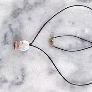 Two beach pebble pendant, two beach stone necklace, beach pebble necklace in black leather cord