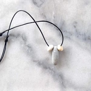 Three beach pebble pendant, beach stones necklace, pebble necklace in a adjustable black leather cord