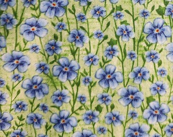 Tropical Vibes blauwe bloemen op groen van Blank Quilting Fabrics.