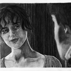 May include: A black and white pencil drawing of a woman with short hair looking to the right. The woman is wearing a striped shirt. The background is blurred and shows a figure of a man.