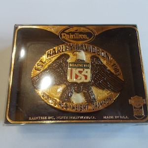 HARLEY DAVIDSON~Belt Buckle~1978~New in Box~Raintree~Nice~Biker~Gift~&quot;Worlds Heavyweight Champion&quot;~Collectable~Motorcycle~Jewelry~Accessory