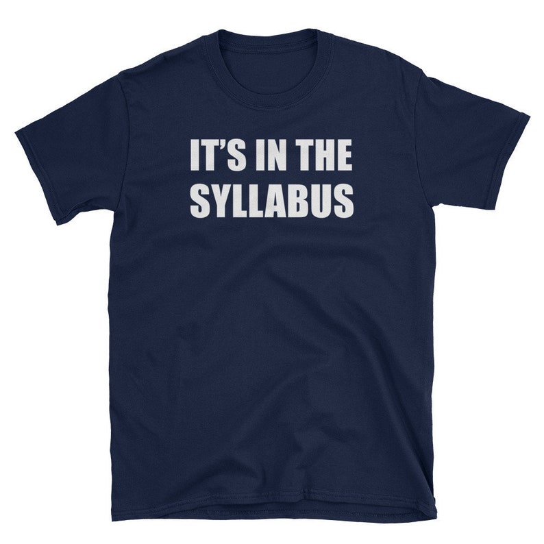 May include: A navy blue t-shirt with white text that reads "IT'S IN THE SYLLABUS".