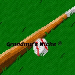 Op de afbeelding: Een bruine houten honkbalknuppel met een witte honkbal op een groene gras achtergrond. De tekst "Grandma's Niche ©" is zichtbaar op de knuppel.