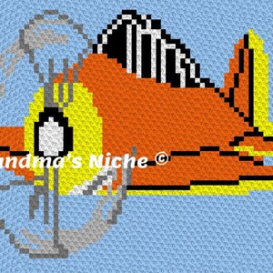 Könnte beinhalten: Ein Häkelmuster eines Cartoon-Fischs in den Farben Orange, Gelb, Schwarz und Weiß. Der Fisch hat einen Propeller auf dem Rücken und ist von Wasser umgeben. Das Muster trägt den Titel "Grandma's Niche".