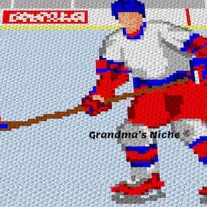May include: A red, white, and blue hockey player with a stick and skates on a blue and white ice rink. The text "Grandma's Niche" is in the lower right corner of the image.