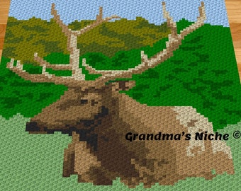 May include: A crochet pattern featuring a brown and white elk with large antlers, set against a green forest background. The pattern includes the text "Grandma's Niche".